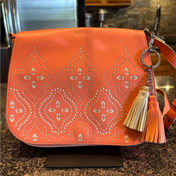 Vera Bradley Handbags - Vera Bradley laser cut Orange Crossbody Bag with Tassels